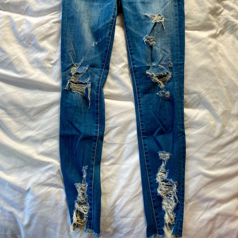 High rise destroyed ripped jeggings